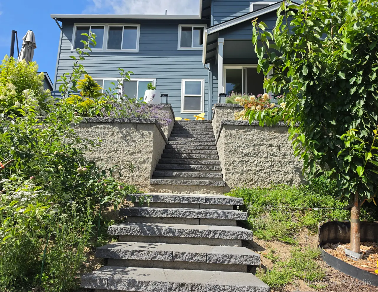 Modular block retaining wall with Steps and NW Native Plantings
